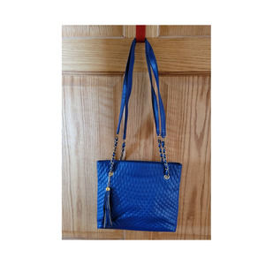 Royal blue with accents of gold handbag